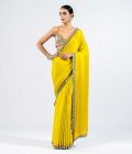 Moss green satin chiffon saree with metallic blouse
