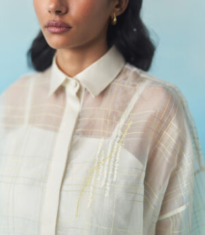 Oversized sheer check top