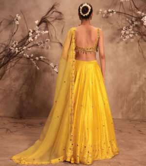 Nazakat Yellow Heavy Mirror Work Sleeveless Lehenga Set