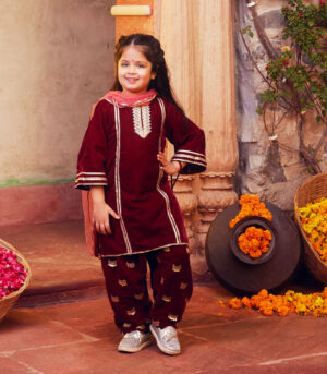 Maroon kurta with matching salwar and dupatta