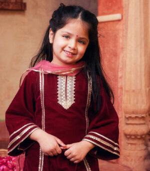 Maroon kurta with matching salwar and dupatta