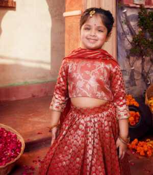 Orange brocade Lehenga with matching Choli and dupatta
