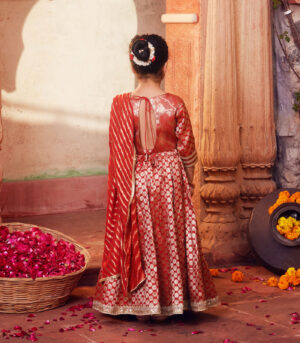 Orange brocade Lehenga with matching Choli and dupatta