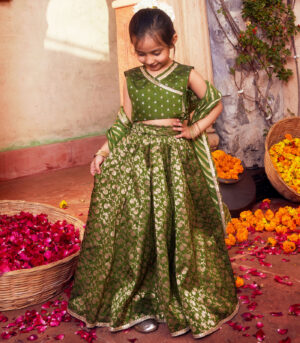 Green brocade lehenga with matching choli and dupatta