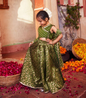 Green brocade lehenga with matching choli and dupatta