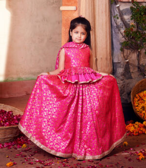 Pink brocade lehenga with matching choli and dupatta