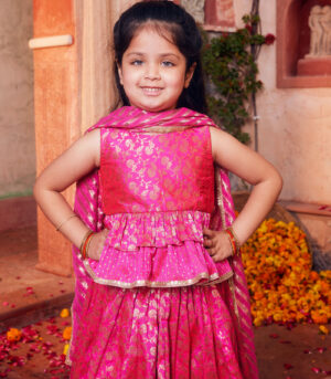 Pink brocade lehenga with matching choli and dupatta